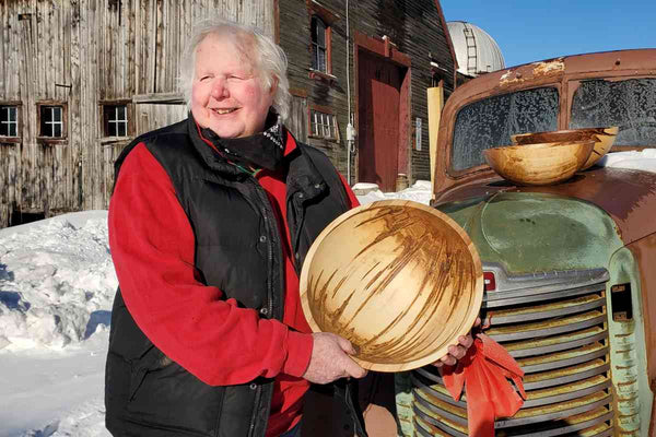 Bowl Man holding Maple Bowl