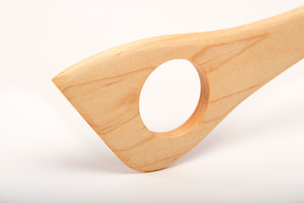 detail of best wood risotto stirring spoon