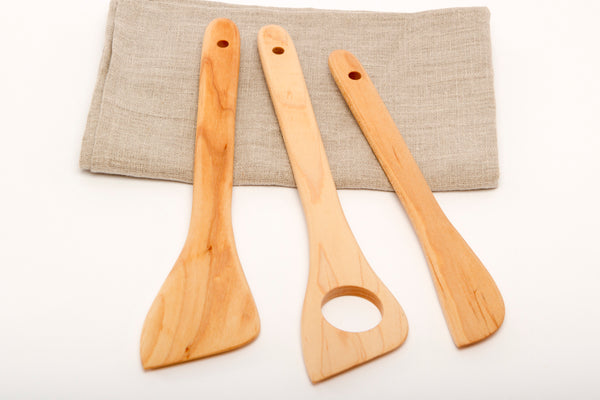 wood risotto stirrer and spatulas